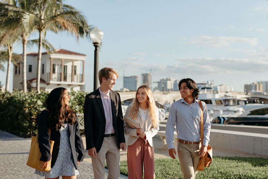 master of business administration mba students walk near the intercoastal waterway in 西<a href='http://apply.rongteer.com'>推荐全球最大网赌正规平台欢迎您</a>.